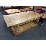 An oak refectory style coffee table