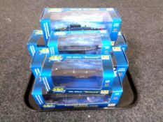 A tray containing six boxed die cast sea power submarines.