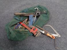 A toolbox and bag containing various tools including wrenches, spanners, socket set etc.