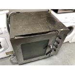 A Smeg stainless steel commercial oven, width 87 cm.