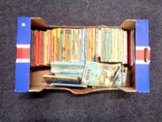 A box containing a large quantity of Ladybird and other children's books