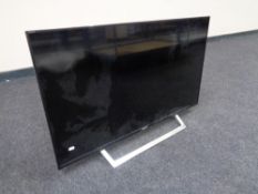 A Sony Bravia 42'' LCD TV with remote