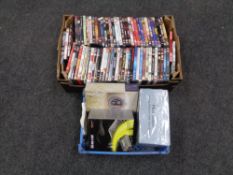 A box containing various DVDs together with a boxed Bush digital CD player,