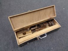 A joiner's toolbox containing vintage hand tools, woodworking planes, brace etc,