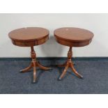 A pair of bird's-eye maple veneered pedestal drum tables