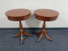 A pair of bird's-eye maple veneered pedestal drum tables