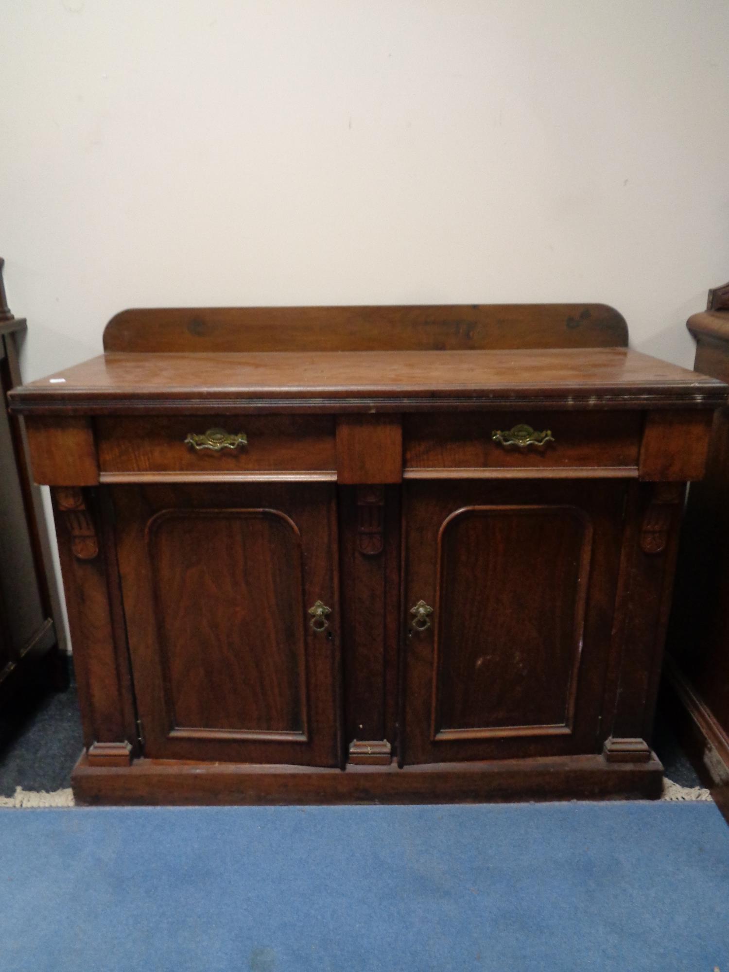 A Victorian walnut chiffonier