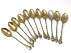 Eleven silver gilt spoons, 84g.