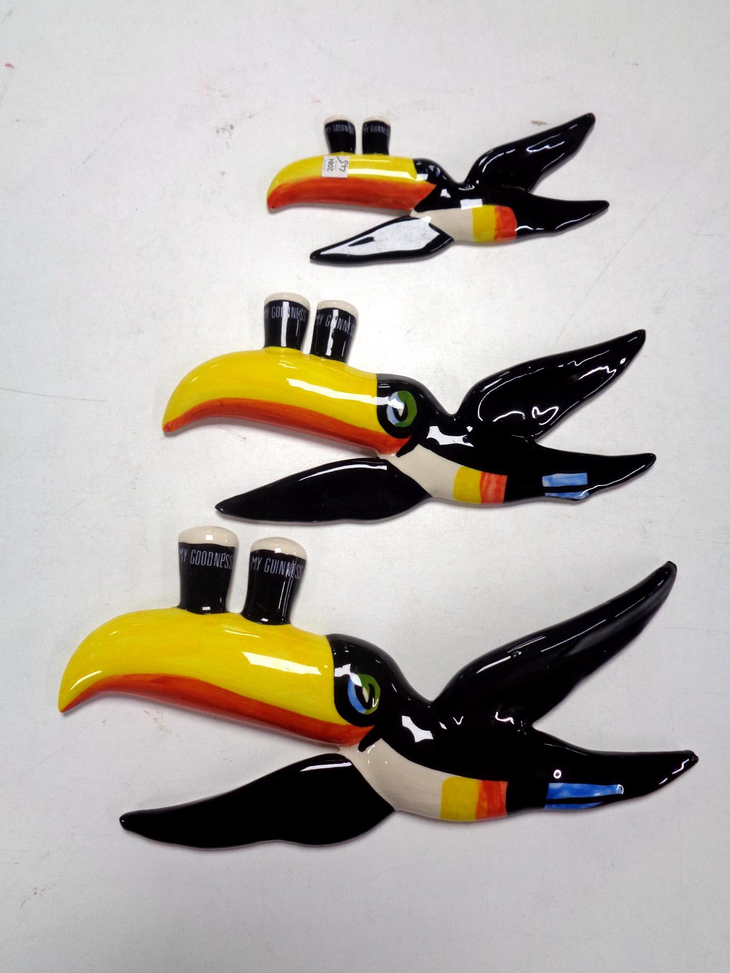 A graduated set of three Carlton ware Guinness toucans