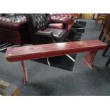 A painted pine bench CONDITION REPORT: 153cm long by 22cm deep by 48cm high.