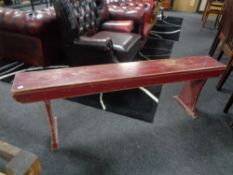 A painted pine bench CONDITION REPORT: 153cm long by 22cm deep by 48cm high.