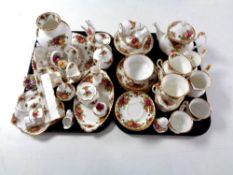 Two trays containing approximately 47 pieces of Royal Albert Old Country Roses tea and dinner china.