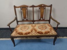 A late Victorian inlaid mahogany two seater salon settee