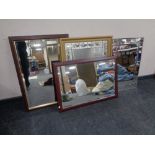 A contemporary all glass bevel edged rectangular mirror together with a gilt framed mirror and two