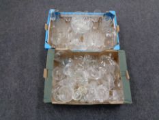 Two boxes containing 20th century glassware.