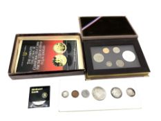 A collection of various silver coins and coin sets