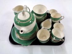 A tray containing 37 pieces of J and G Meakin green and gilt tea china.