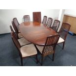 A Skovby contemporary rose wood effect extending table,