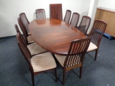 A Skovby contemporary rose wood effect extending table,