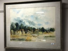 A 20th century watercolour, Field with village beyond, signed Phillips.