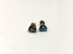 A pair of 10ct gold blue topaz earrings