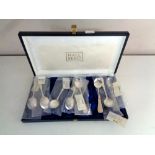 A boxed set of eight Hallbergs silver teaspoons