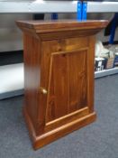 An Eastern mahogany cabinet