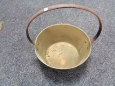 An antique brass jam pan