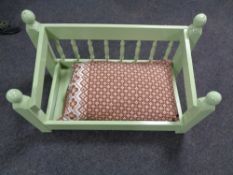 A painted four poster dog's bed