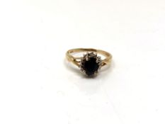 A 10ct gold sapphire and diamond ring, size N CONDITION REPORT: 1.