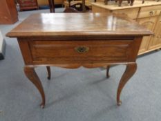 An early 20th century oak side table,