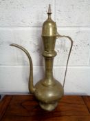 An Eastern brass teapot