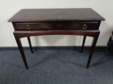 A Stag Minstrel side table fitted a drawer