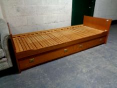 A pine 3ft pull out bed frame,