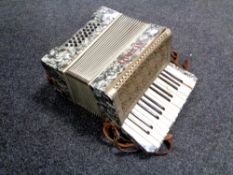 A 20th century Alvari piano accordion.