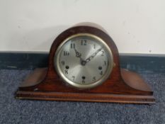 An oak cased 1930s Enfield mantel clock with silvered dial