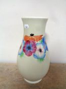 A Newport pottery Clarice Cliff vase decorative with flowers,