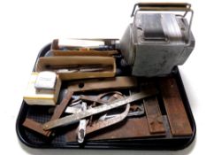 A tray containing a MEG insulation tester, vintage joinery tools and measures by Moore and Wright,