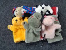 A tray containing eight Sooty and Rainbow glove puppets