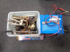 A Draper BCS200 battery charger together with a plastic crate containing suction pump, clamp,