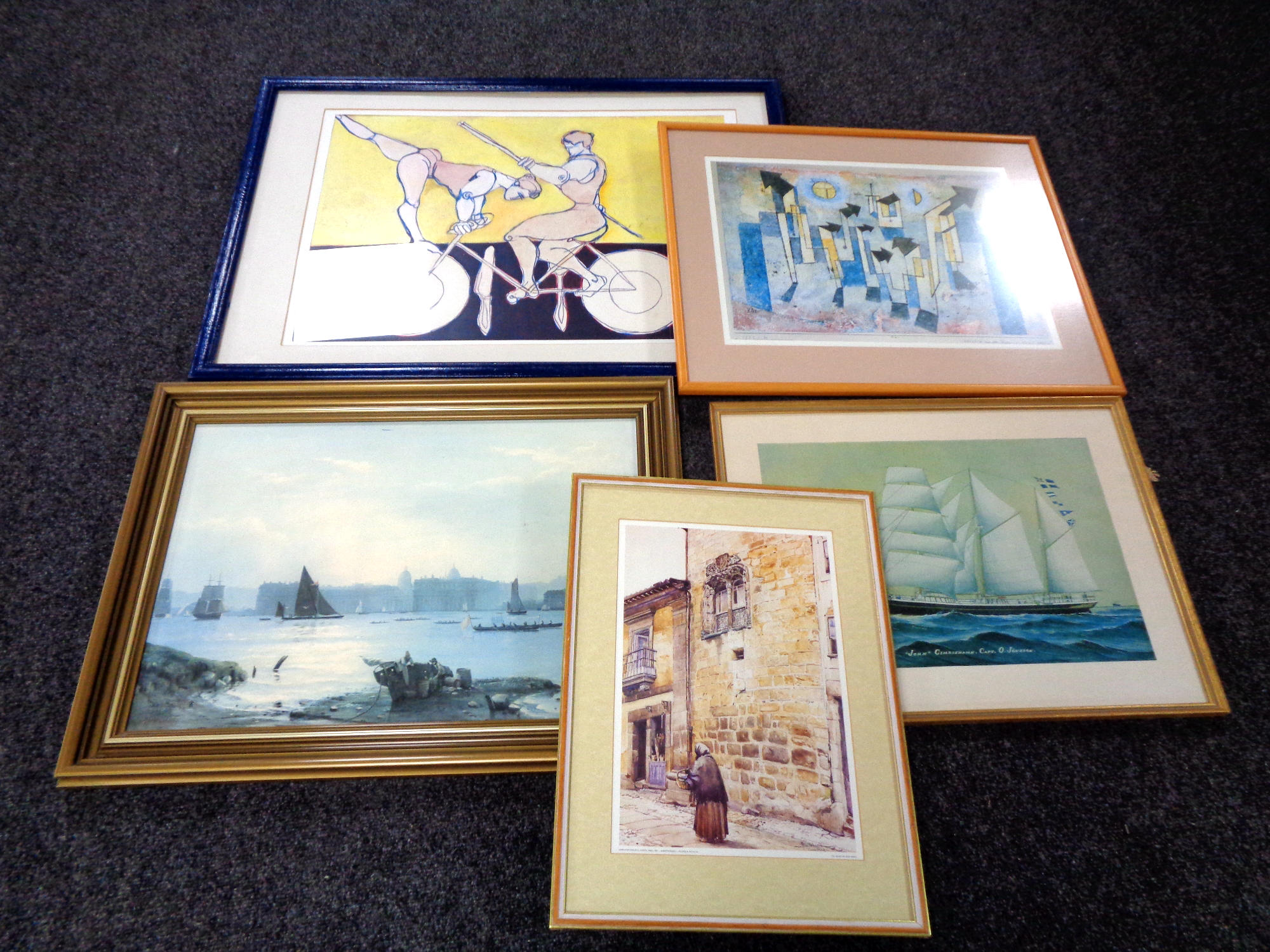 A framed E Thompson print of a tall ship together with four other framed prints