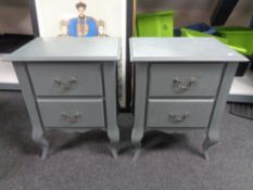 A pair of painted two drawer French style bedside stands