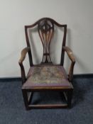 A 19th century Hepplewhite style armchair with a tapestry upholstered seat