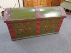 A 19th century painted dome topped shipping trunk with metal mounts