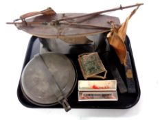 A tray containing vintage wooden pond yacht on stand, a metal bed warmer head,