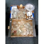 Two boxes of assorted glass ware to include drinking glasses, candlestick, comport, decanters,