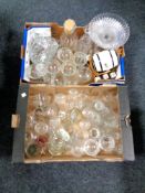 Two boxes of assorted glass ware to include drinking glasses, candlestick, comport, decanters,