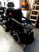 A Quickie Salsa M2 mini electric wheelchair with instructions and charger (cost new £7,