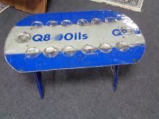 An upcycled oil drum coffee table