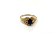 A 14ct gold sapphire and diamond ring,